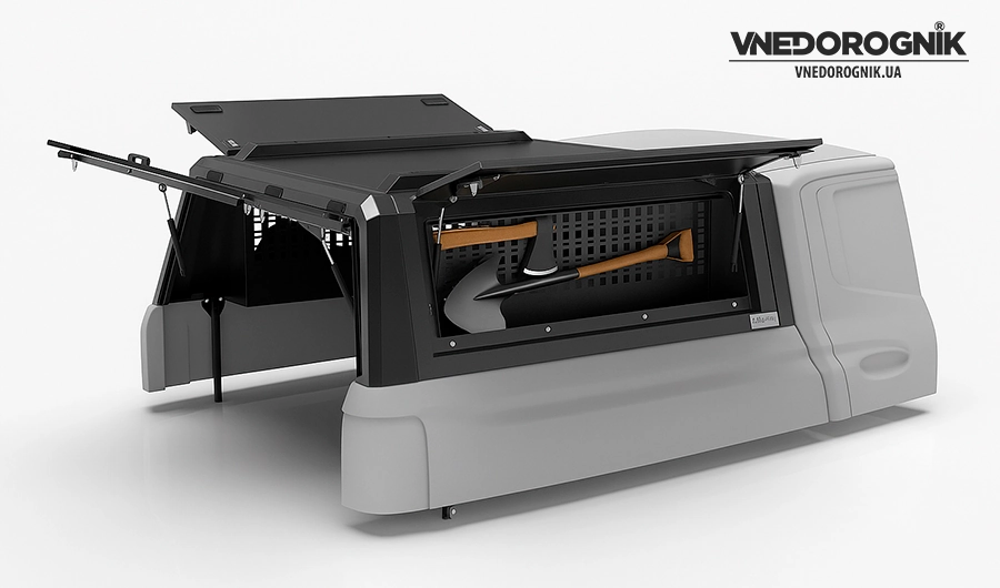 Side metal organizer installed in a niche above the wheel arch in the trunk of an SUV for storing rigging equipment.