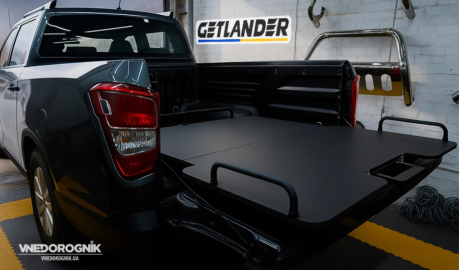 Getlander pull-out tray (shelf) installed on the drawer system in the pickup truck bed for easy access to cargo.