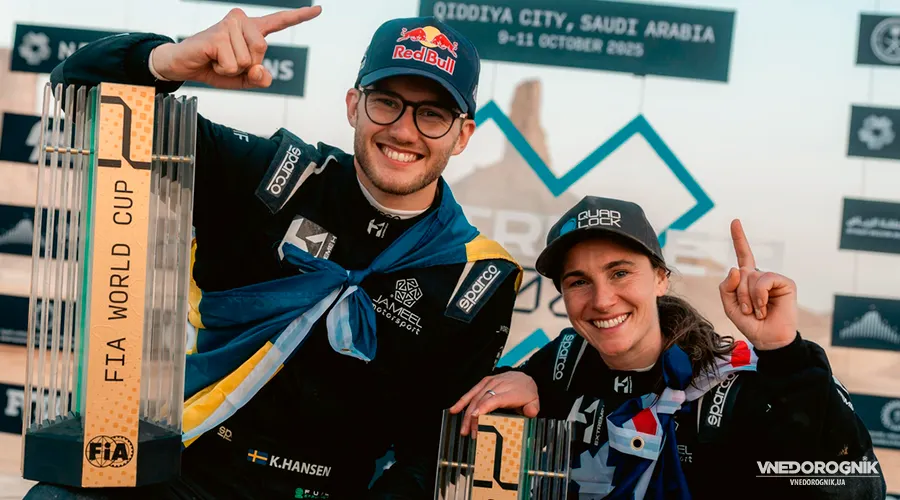 Drivers Molly Taylor and Kevin Hansen with the Jameel Motorsport team celebrate their victory on the podium of the first FIA Extreme H World Cup.