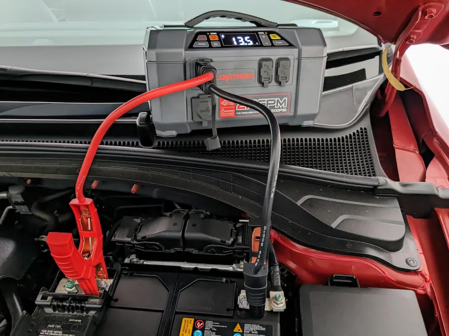 Jump starter used to start an off-road SUV in winter conditions