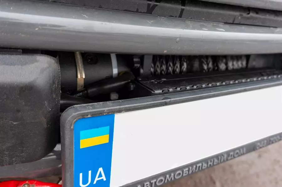 Крепление для рамки номерного знака