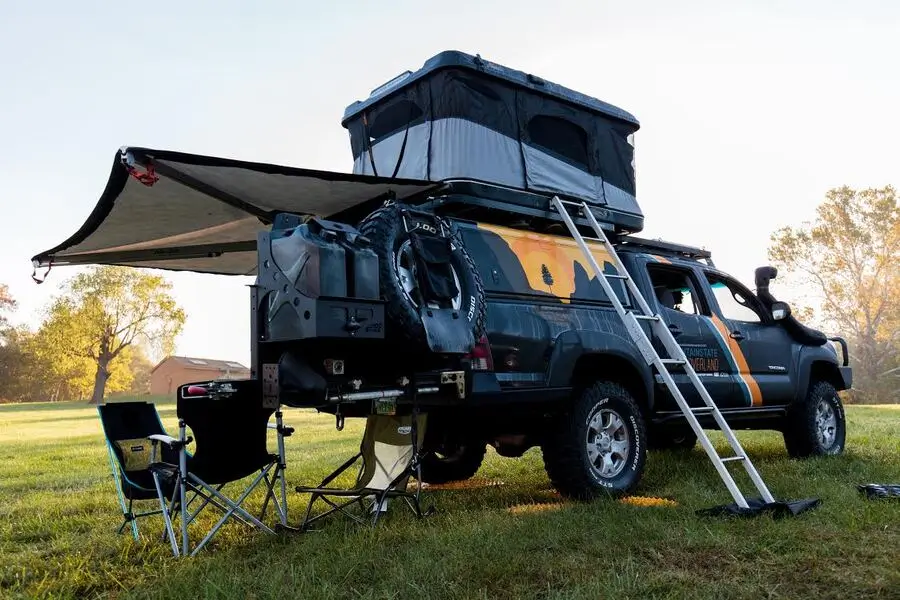 Rooftop tent with awning on a pickup truck