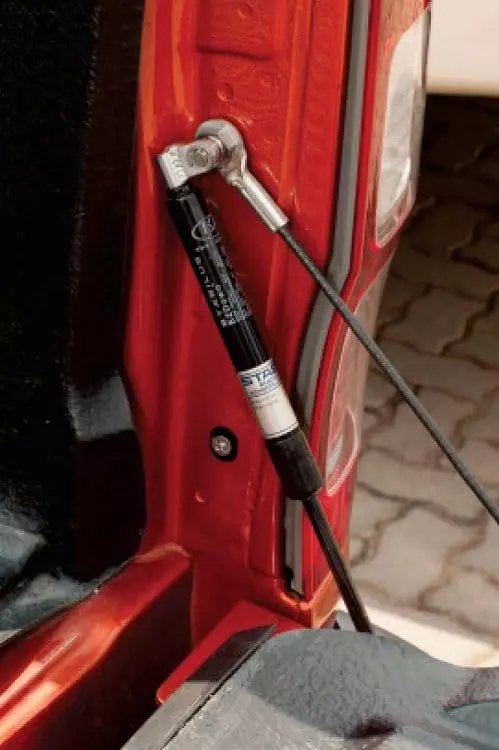 Амортизатор заднего борта (ляды) EZ Down для Nissan Navara 2016